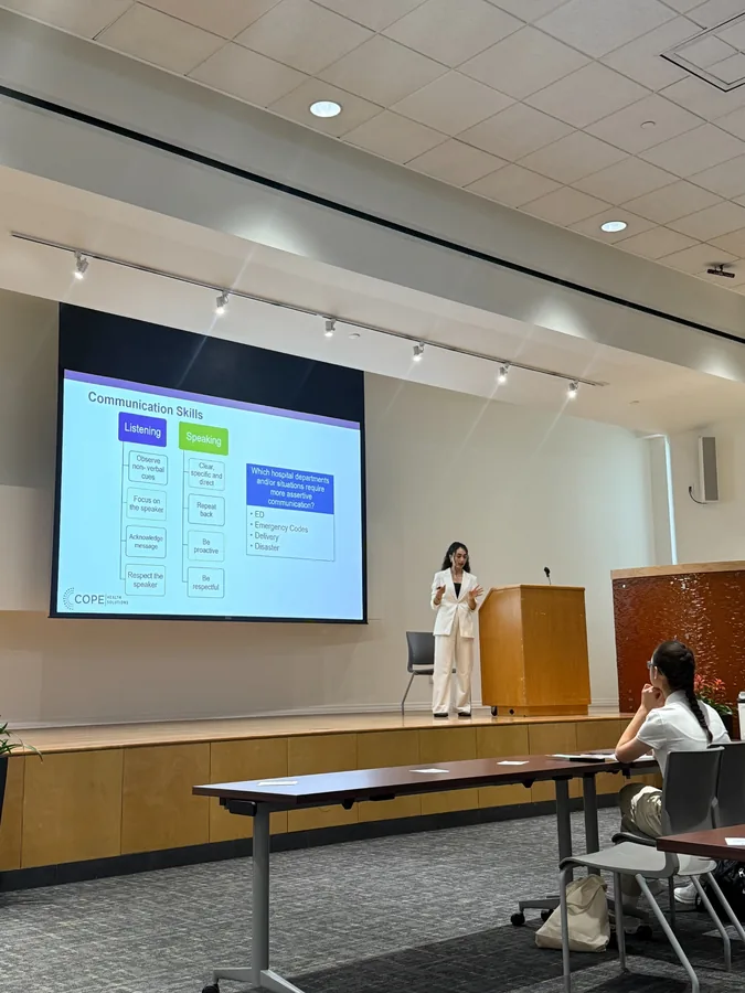COPE Health Scholars presentation on communication skills in a classroom setting