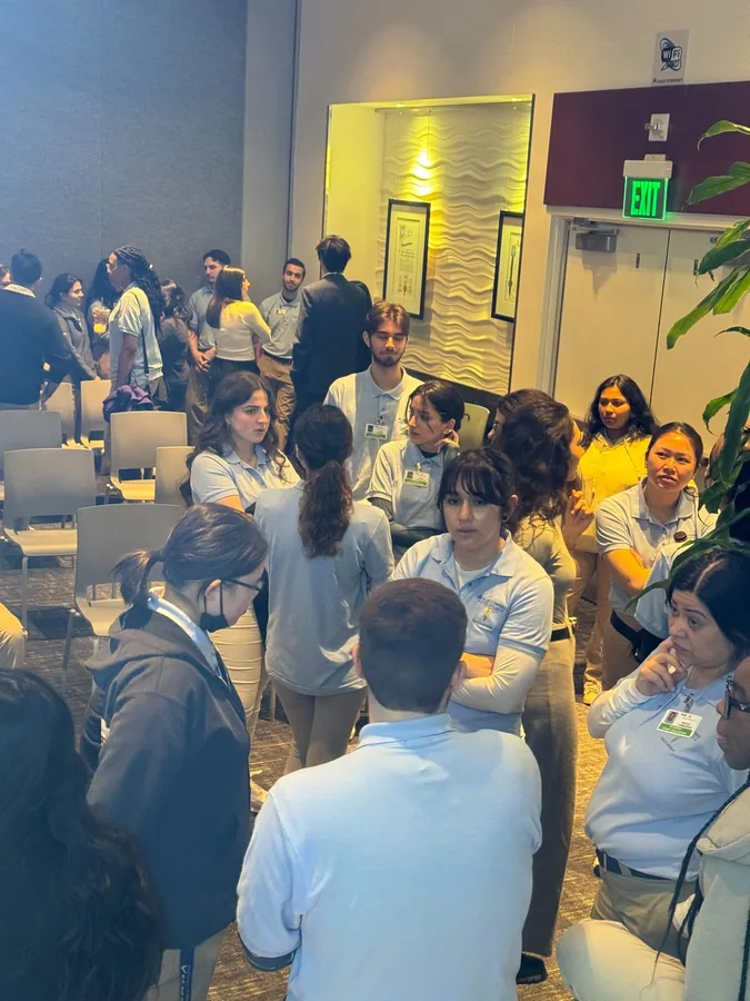 COPE Health Scholars participants networking and connecting during a professional event
