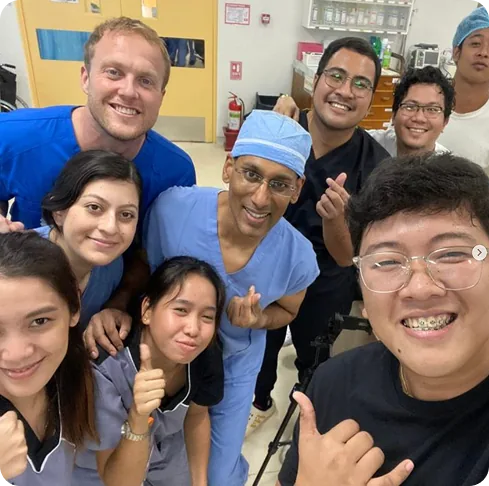 COPE Health Scholars group selfie in a clinical setting
