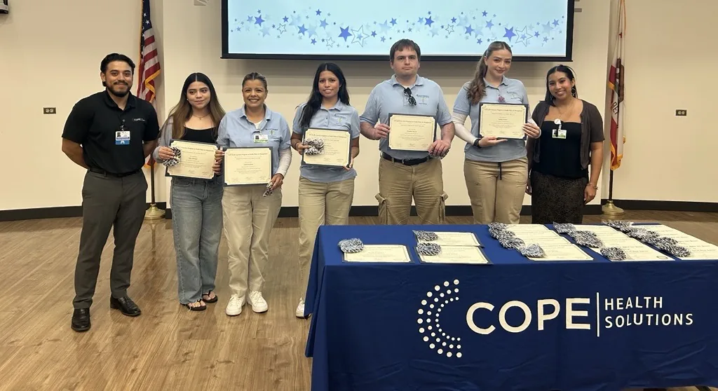 Scholars recognized at a certificate ceremony