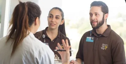 Junior Health Scholars learning from a healthcare professional